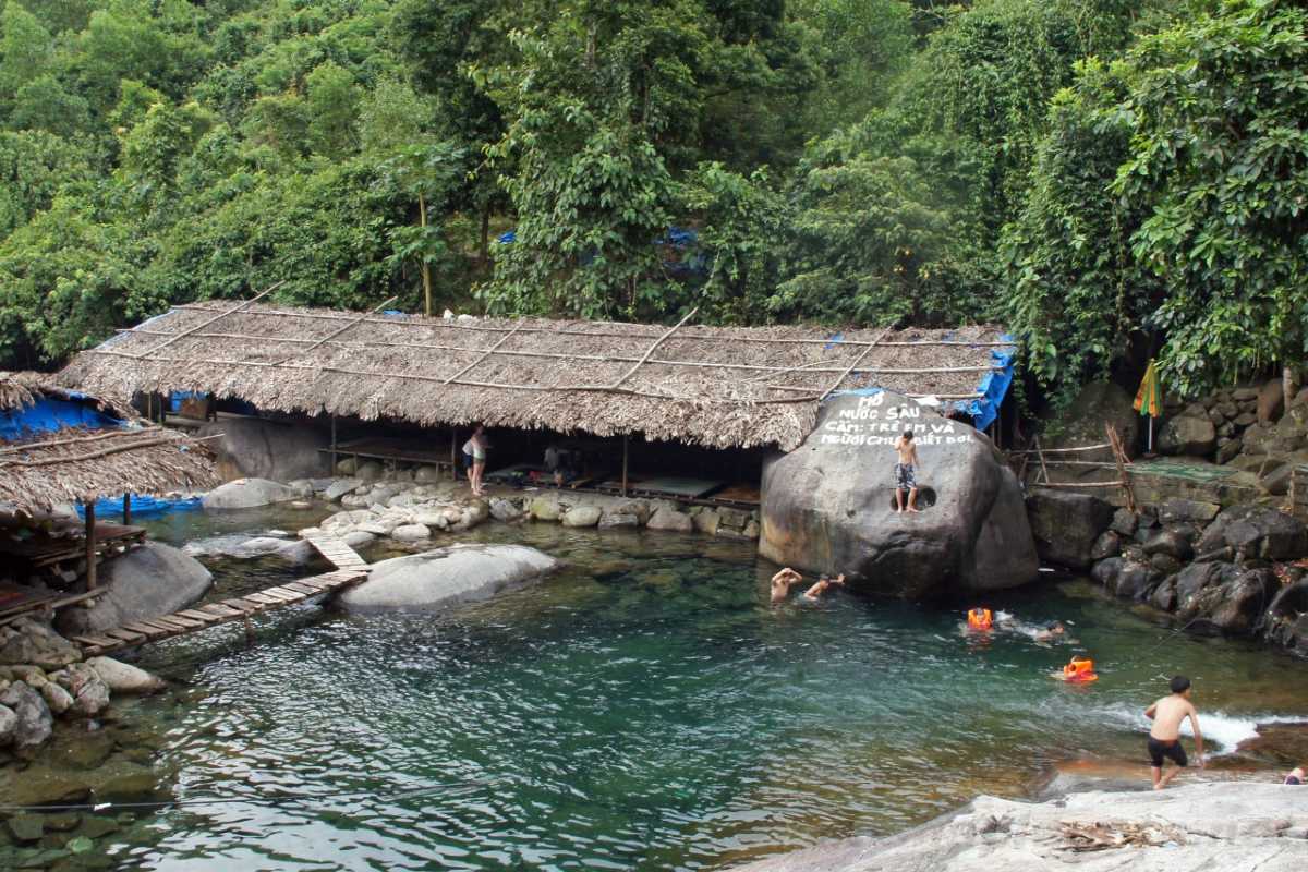 Elephant rock and clear stream at Elephant Springs Iconic elephant-shaped rock near a clear, flowing stream at Elephant Springs Hue