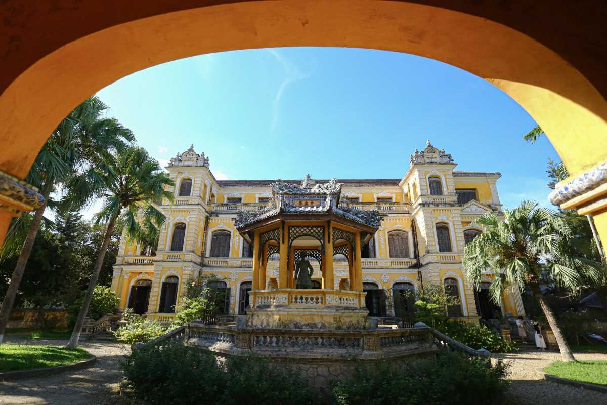 Exterior View of An Dinh Palace with Pavilion Exterior view of An Dinh Palace with central pavilion and lush gardens in Hue