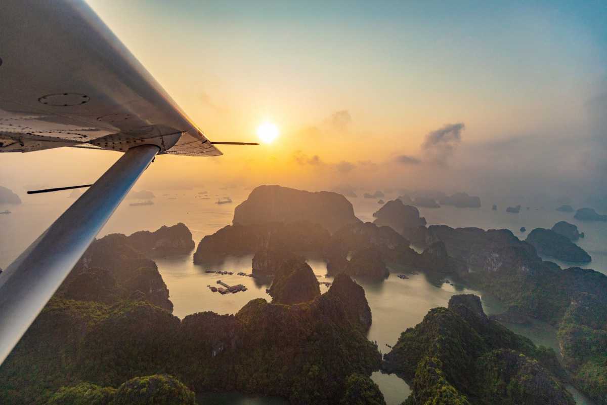 Fairy Lake Halong Bay aerial view at sunrise Fairy Lake Halong Bay aerial view showcasing lush limestone karsts and calm water at sunrise, highlighting natural beauty