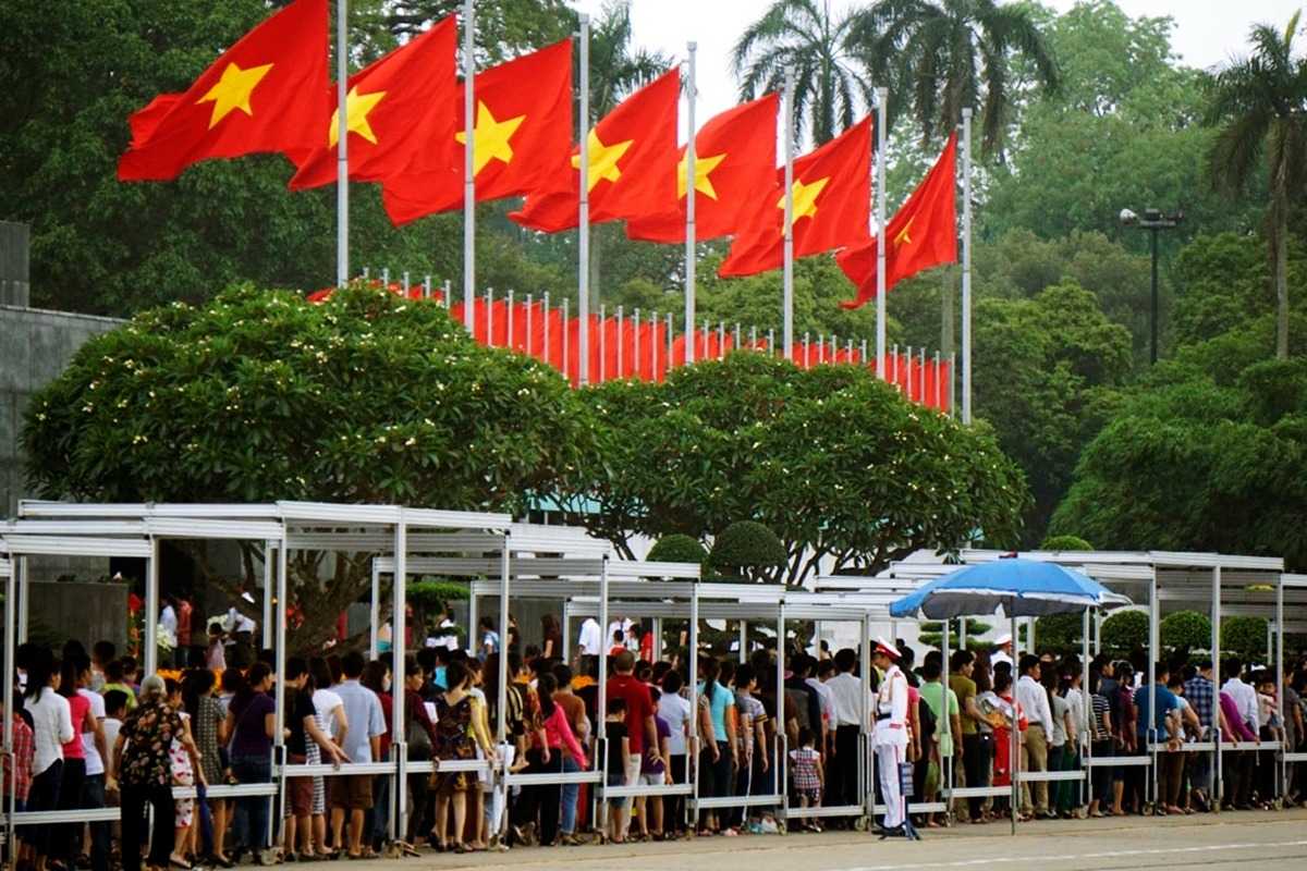 Flag Display at Ho Chi Minh Mausoleum Rows of Vietnamese flags displayed along the path to the mausoleum