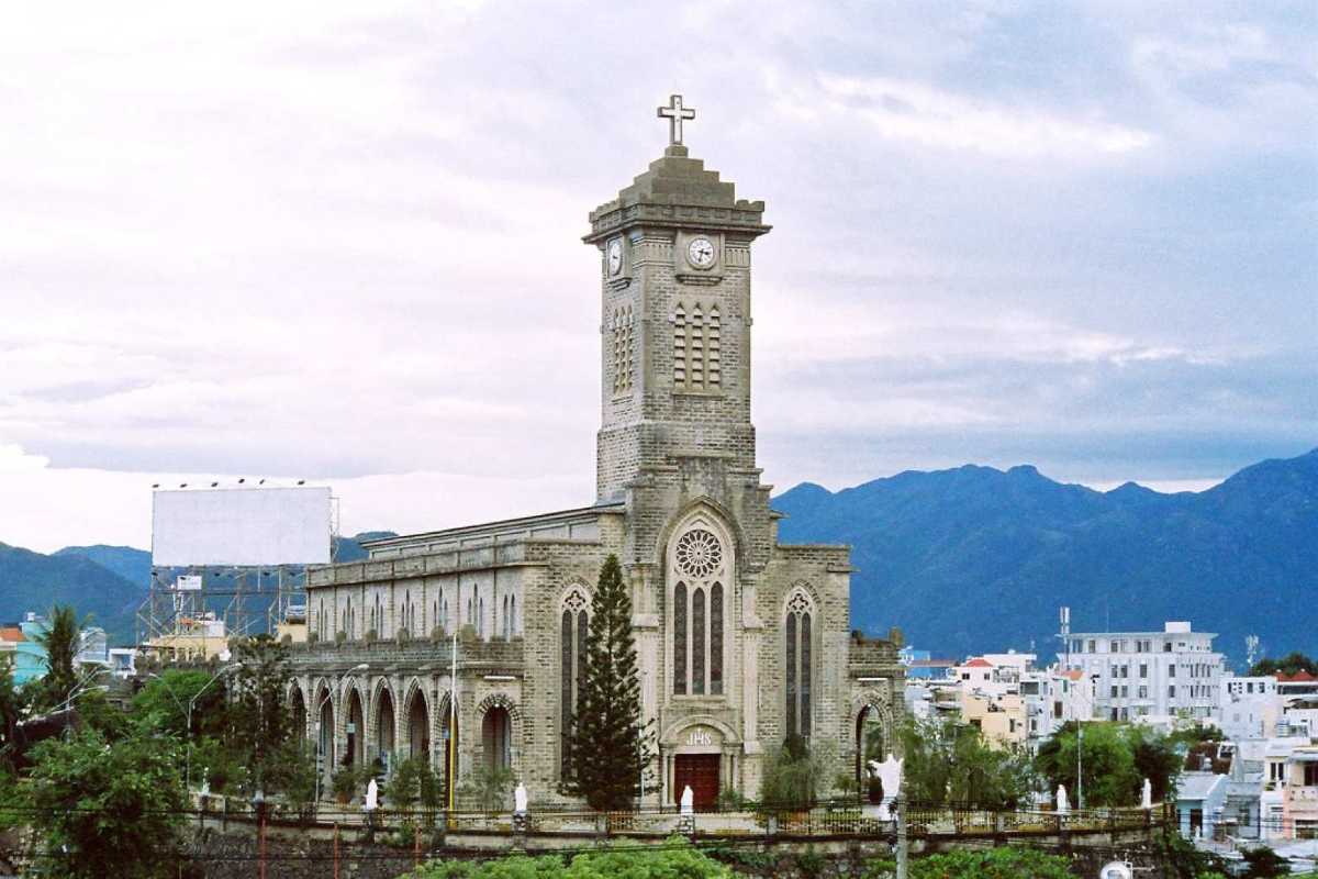 Full View of Nha Trang Mountain Church Full frontal view of Nha Trang Mountain Church with tower, Gothic façade, and surrounding garden