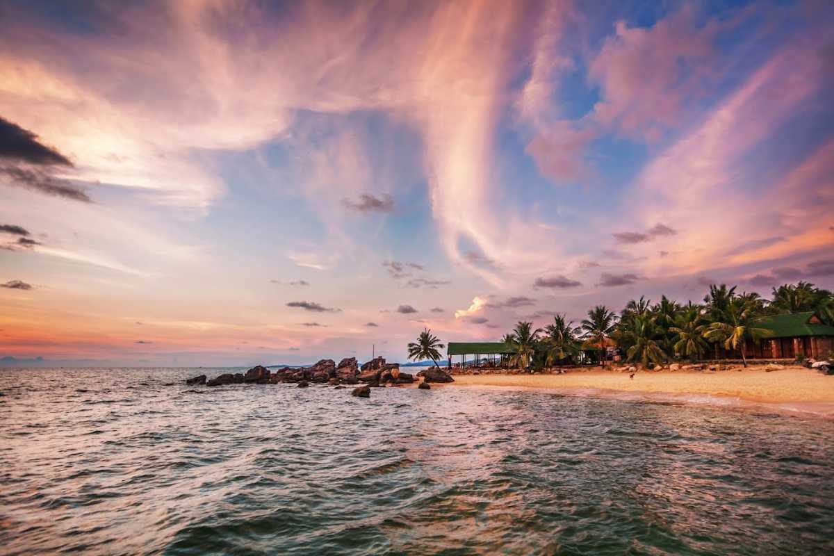 Ganh Dau Cape Sunset A breathtaking sunset view over the ocean at Ganh Dau Cape, with vibrant sky colors.
