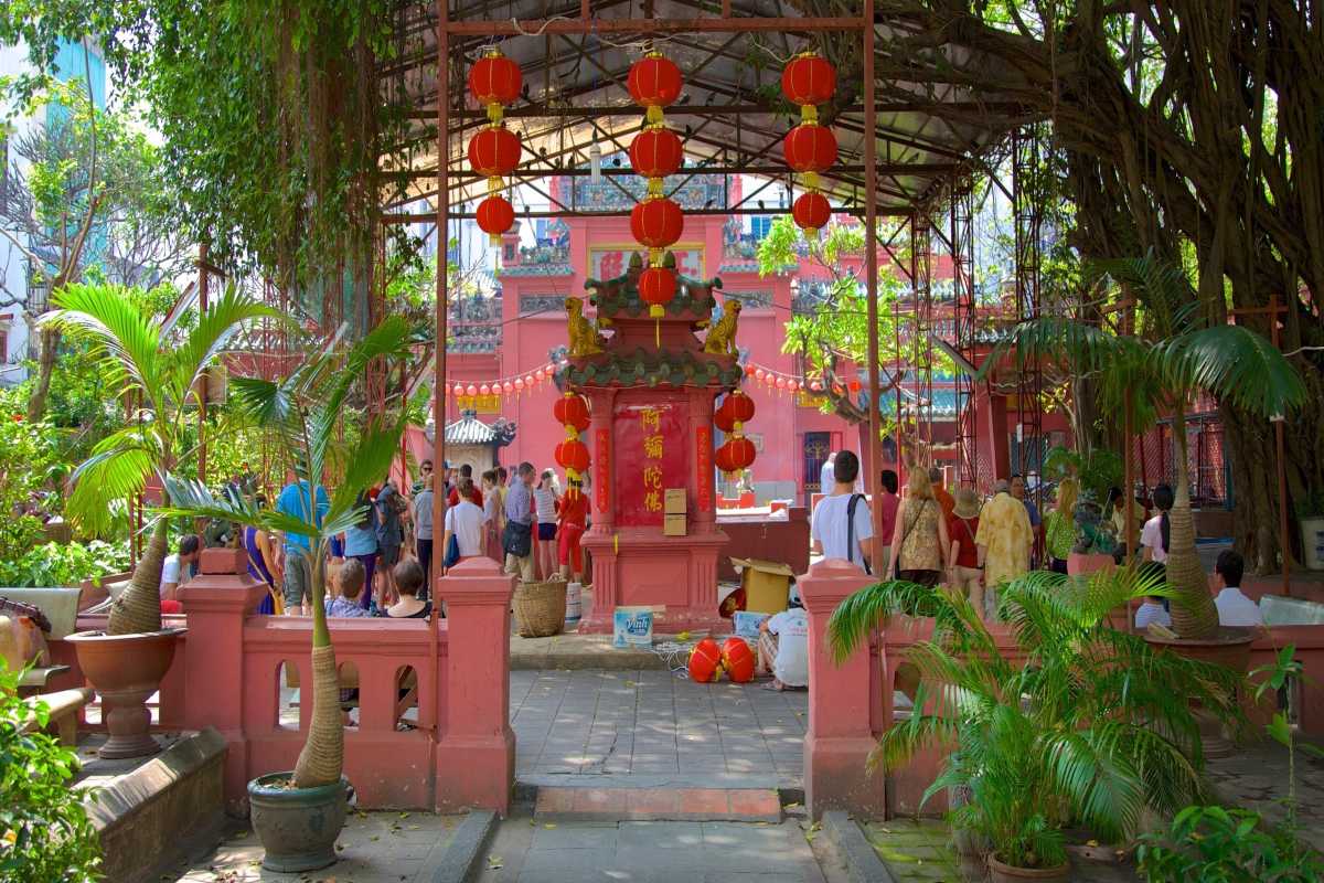 Giac Lam Pagoda Courtyard with Red Lanterns Crowded courtyard decorated with red lanterns and Buddhist flags at Giac Lam Pagoda in Ho Chi Minh City