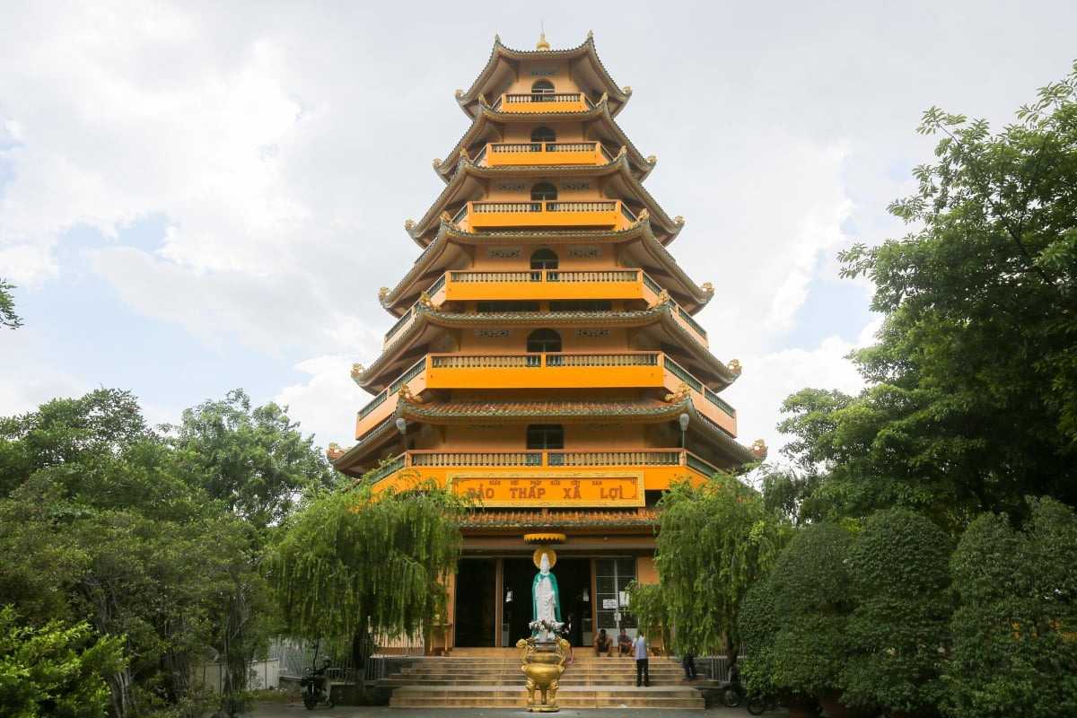 Giac Lam Pagoda Golden Buddha Statues Group of golden Buddha statues positioned inside Giac Lam Pagoda