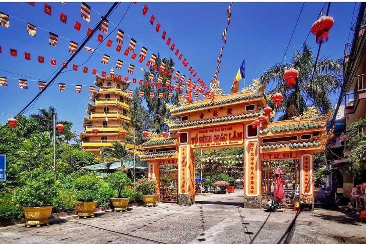 Giac Lam Pagoda Grand Entrance Gate The grand entrance gate of Giac Lam Pagoda decorated with traditional motifs and red accents