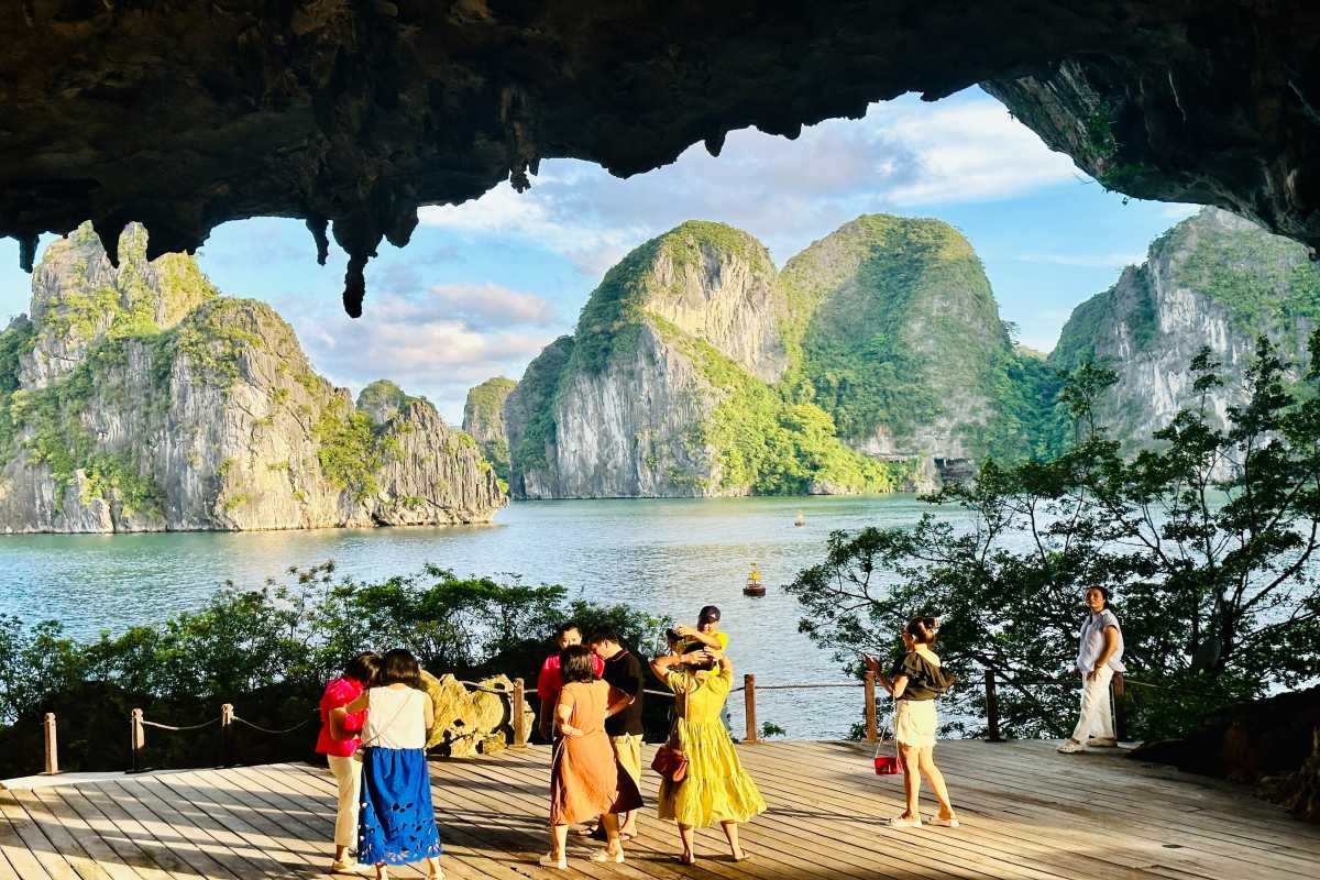 Halong Bay cruise boats near Drum Cave Traditional cruise boats sailing near Drum Cave Halong Bay, popular among tourists exploring the bay.