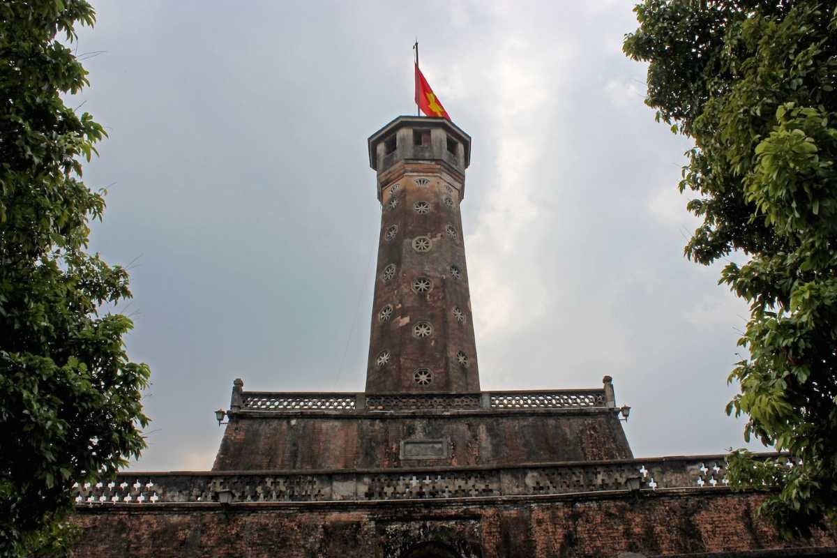 Hanoi Flag Tower with Historic Cannons View Historic cannons lined up beside Hanoi Flag Tower under bright daylight
