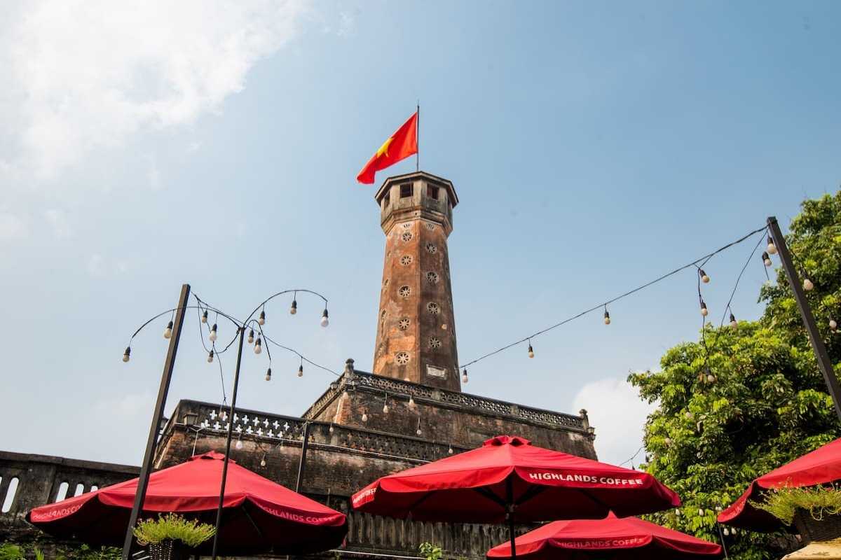 Hanoi Flag Tower with Historic Cannons Historic cannons displayed along the wall of Hanoi Flag Tower under partly cloudy sky