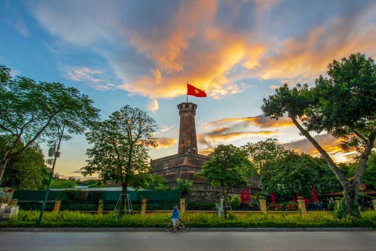 Hanoi Flag Tower Entrance with Trees Main entrance of Hanoi Flag Tower flanked by green trees and historic brick walls