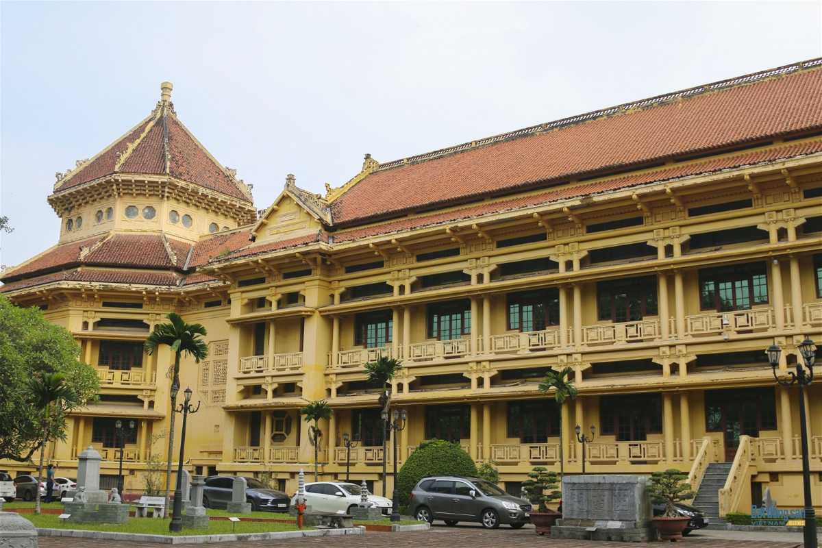 Hanoi French Quarter Historical Building Exterior Yellow historical building with red roof in Hanoi French Quarter