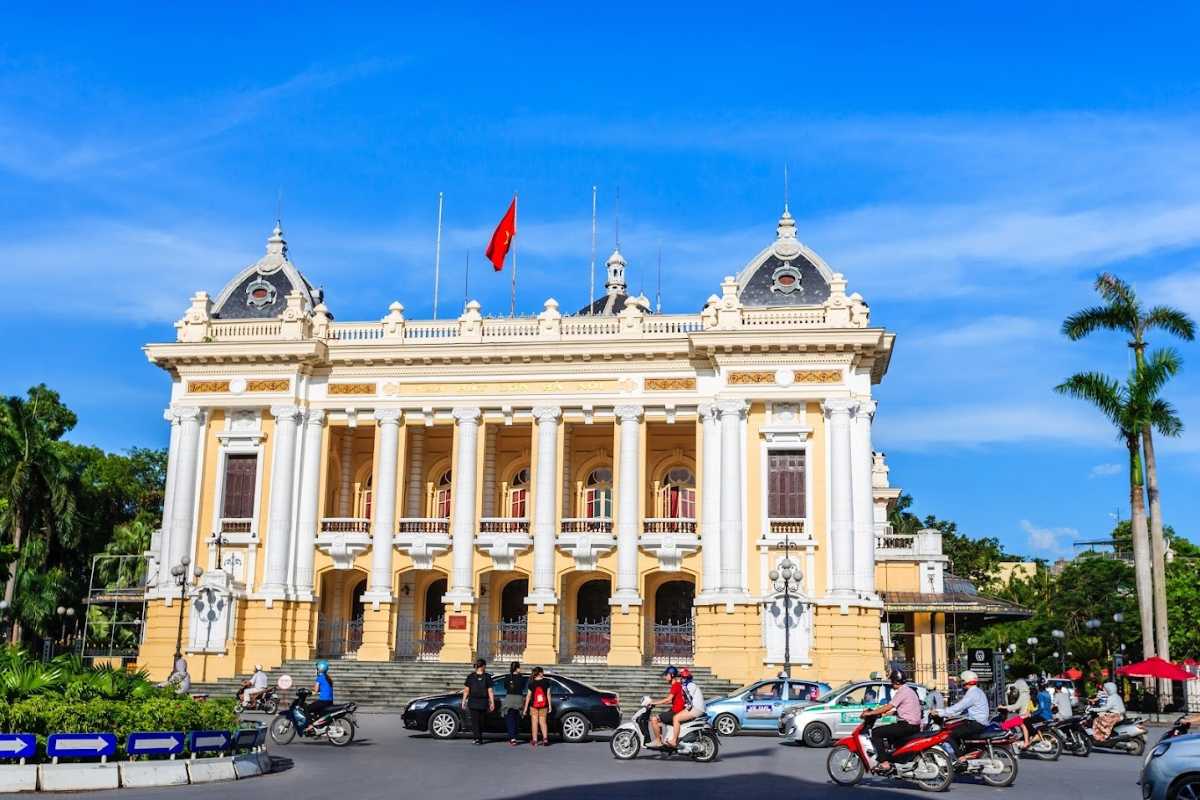 Hanoi Opera House Interior Seating Elegant seating rows inside Hanoi Opera House with warm lighting