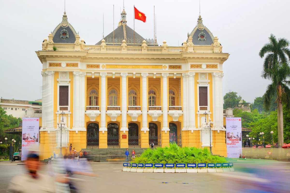 Hanoi Opera House Interior Stage View Ornate stage inside Hanoi Opera House with seats filled with an audience