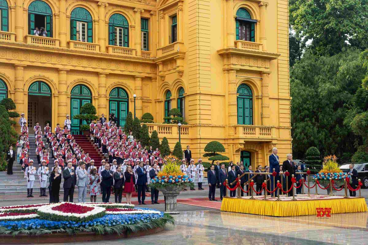 Hanoi Presidential Palace Aerial View of Building and Gardens Aerial view showing the yellow Hanoi Presidential Palace surrounded by green gardens and fountains