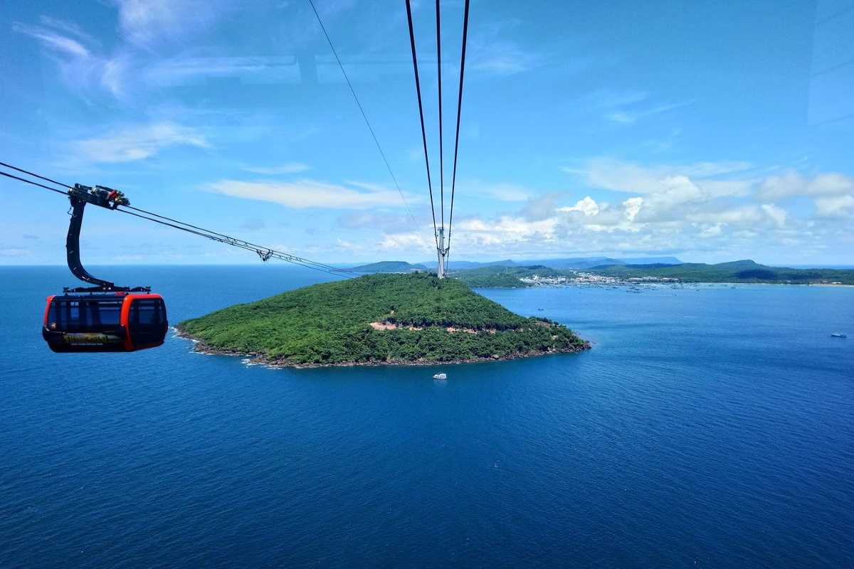 Hon Thom Cable Car Cabin Flying Over Sea Cable car cabin flying over the blue sea near Hon Thom Cable Car Station at Phu Quoc Island