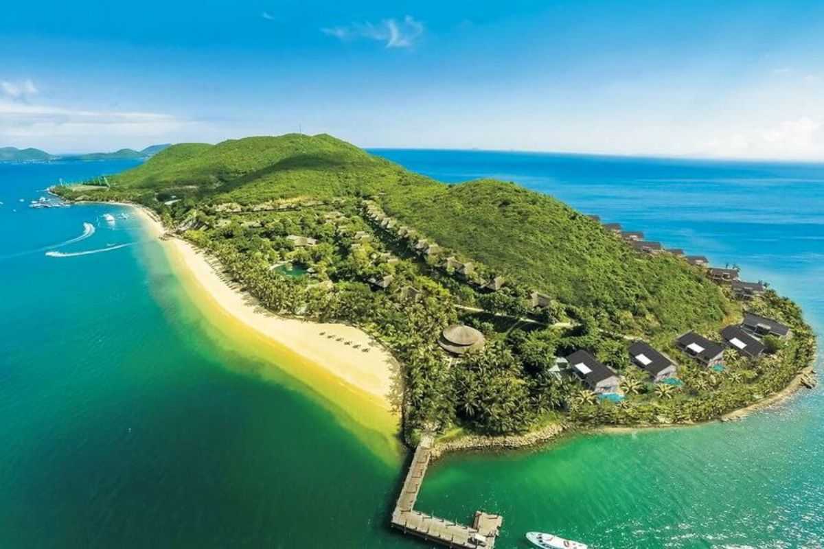 Aerial View of Hon Tre Island Vietnam Drone view of Hon Tre Island showing sandy beaches, lush forests, and resort coastline