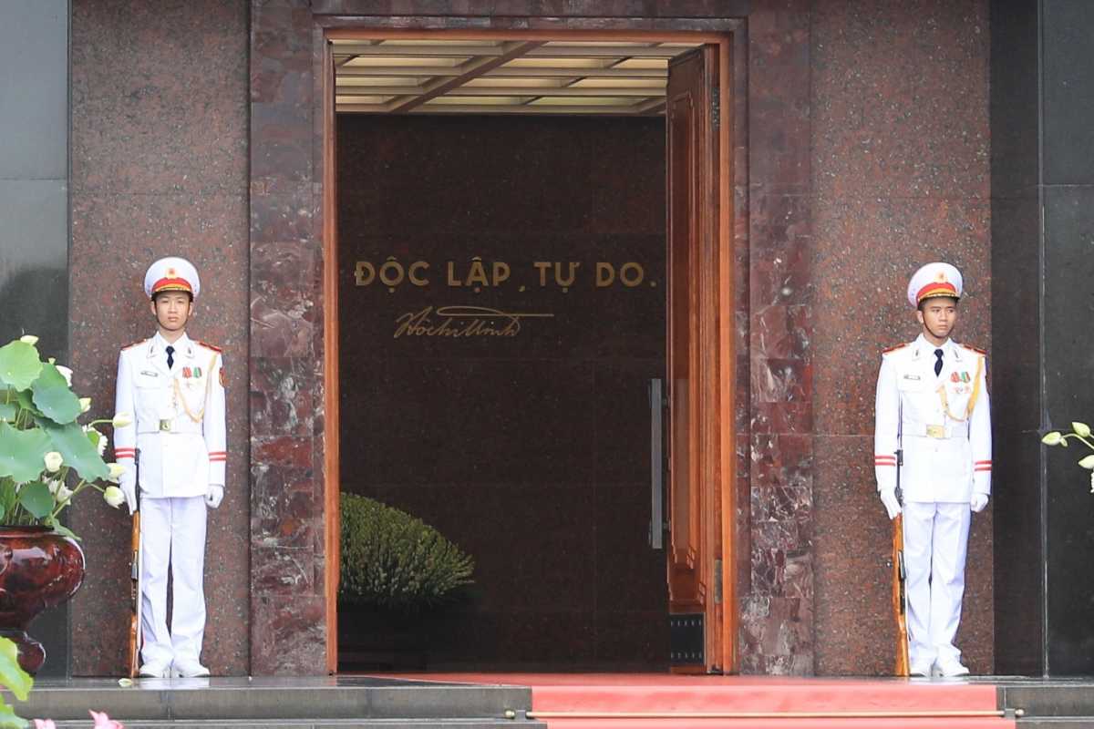Honor Guard at Ho Chi Minh Mausoleum Two honor guards standing at the main entrance of the Ho Chi Minh Mausoleum in Hanoi