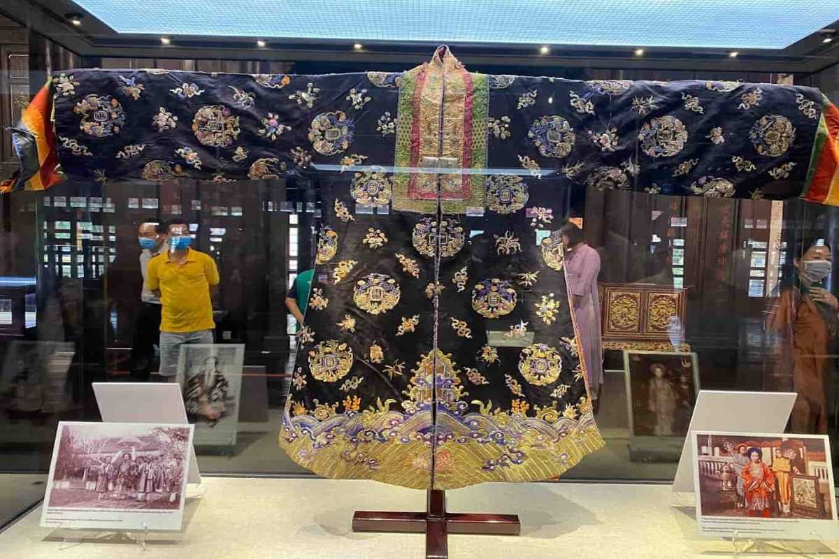 Royal embroidered robe at Hue Museum of Royal Antiquities Royal embroidered robe with intricate patterns from the Nguyen Dynasty, displayed at Hue Museum of Royal Antiquities