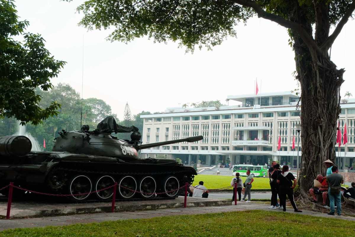 Independence Palace Saigon Exterior with Fountain Exterior facade of Independence Palace Saigon with large fountain spraying water in front
