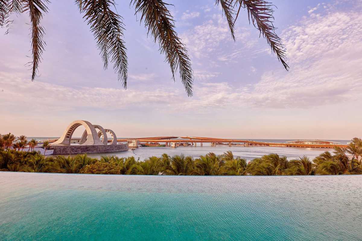 Infinity Pool View Overlooking Kiss Bridge Phu Quoc Infinity pool overlooking the Kiss Bridge and coastline at Phu Quoc Island