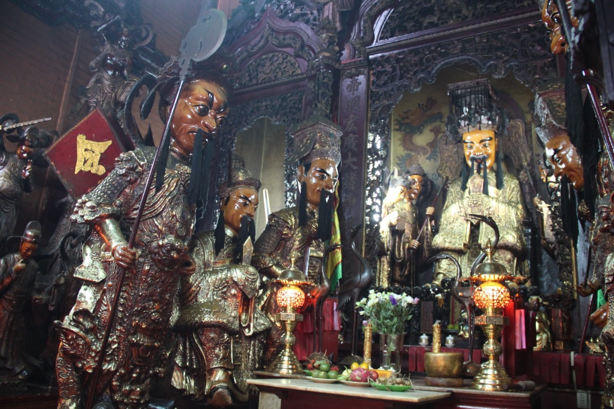 Jade Emperor Pagoda altar with statues in Saigon