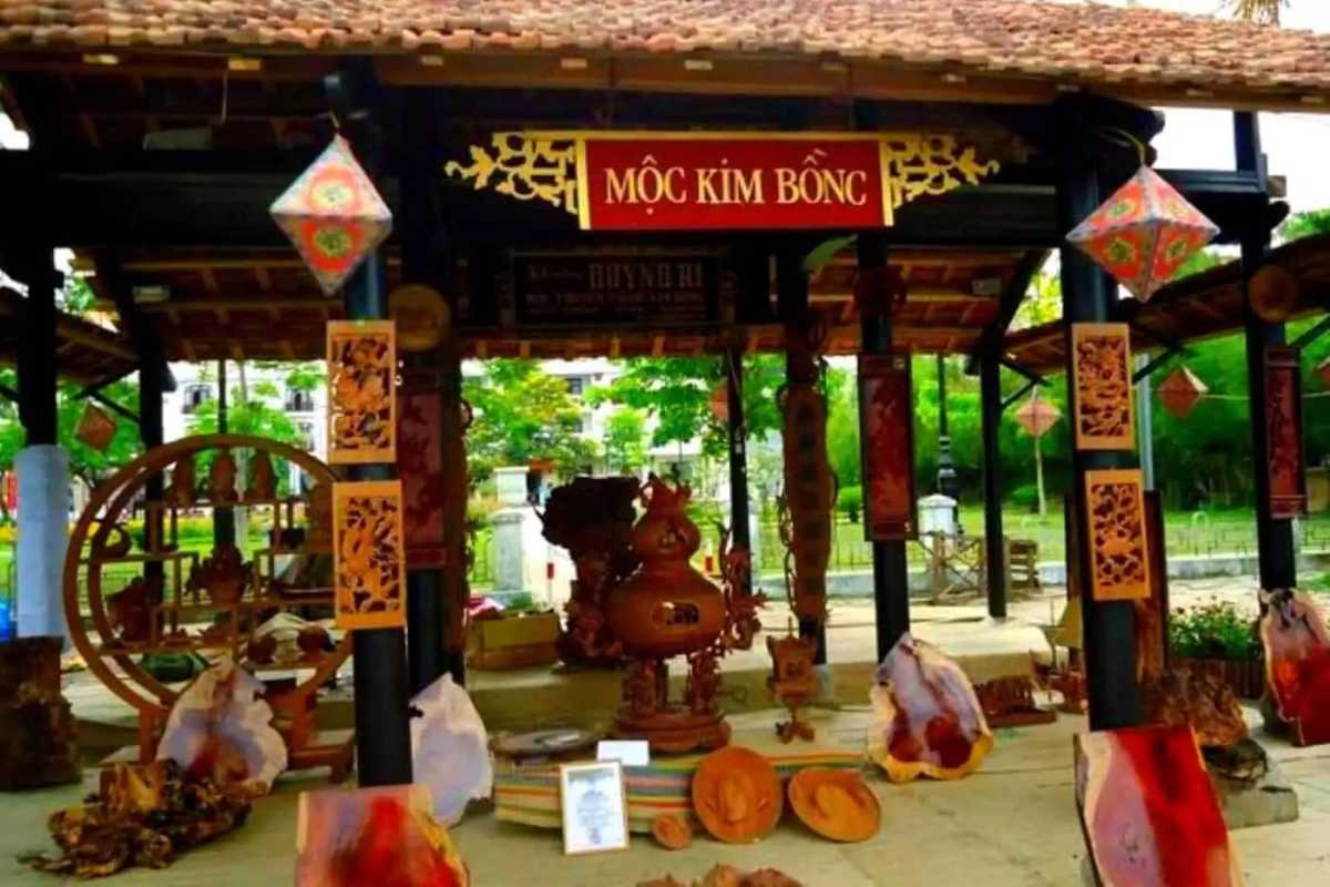 Kim Bong Carpentry Village Entrance with Traditional Woodworks Entrance pavilion at Kim Bong Carpentry Village showcasing traditional Vietnamese woodworking art