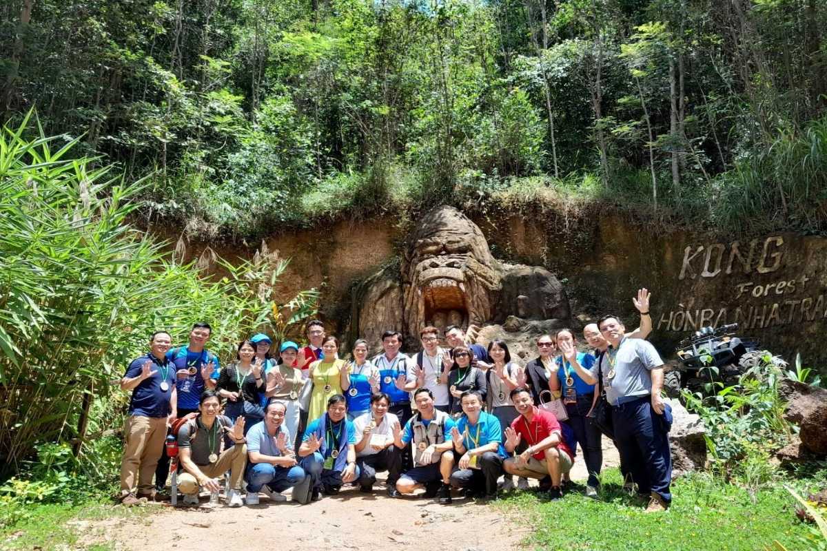 Kong Forest River Rafting Experience Group of tourists wearing life jackets enjoying river rafting in Kong Forest, Hon Ba Nature Reserve