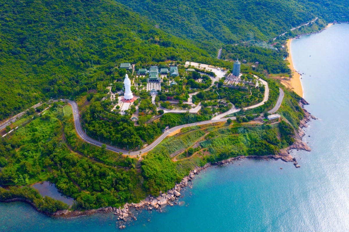 Aerial view of Linh Ung Pagoda Da Nang with the Lady Buddha statue and the scenic coastline