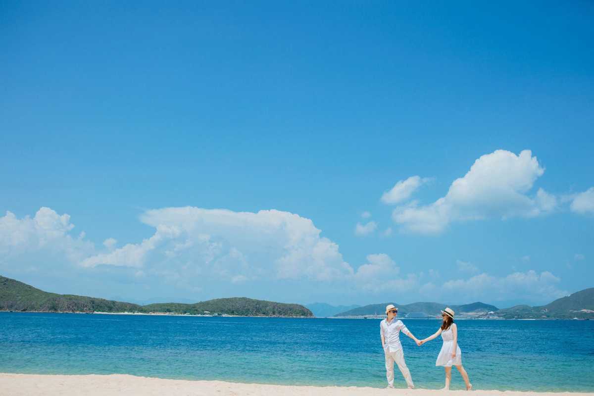 Long Beach (Bãi Dài) Phu Quoc - Romantic Beach Walk A couple enjoying a romantic walk on the beach at Long Beach