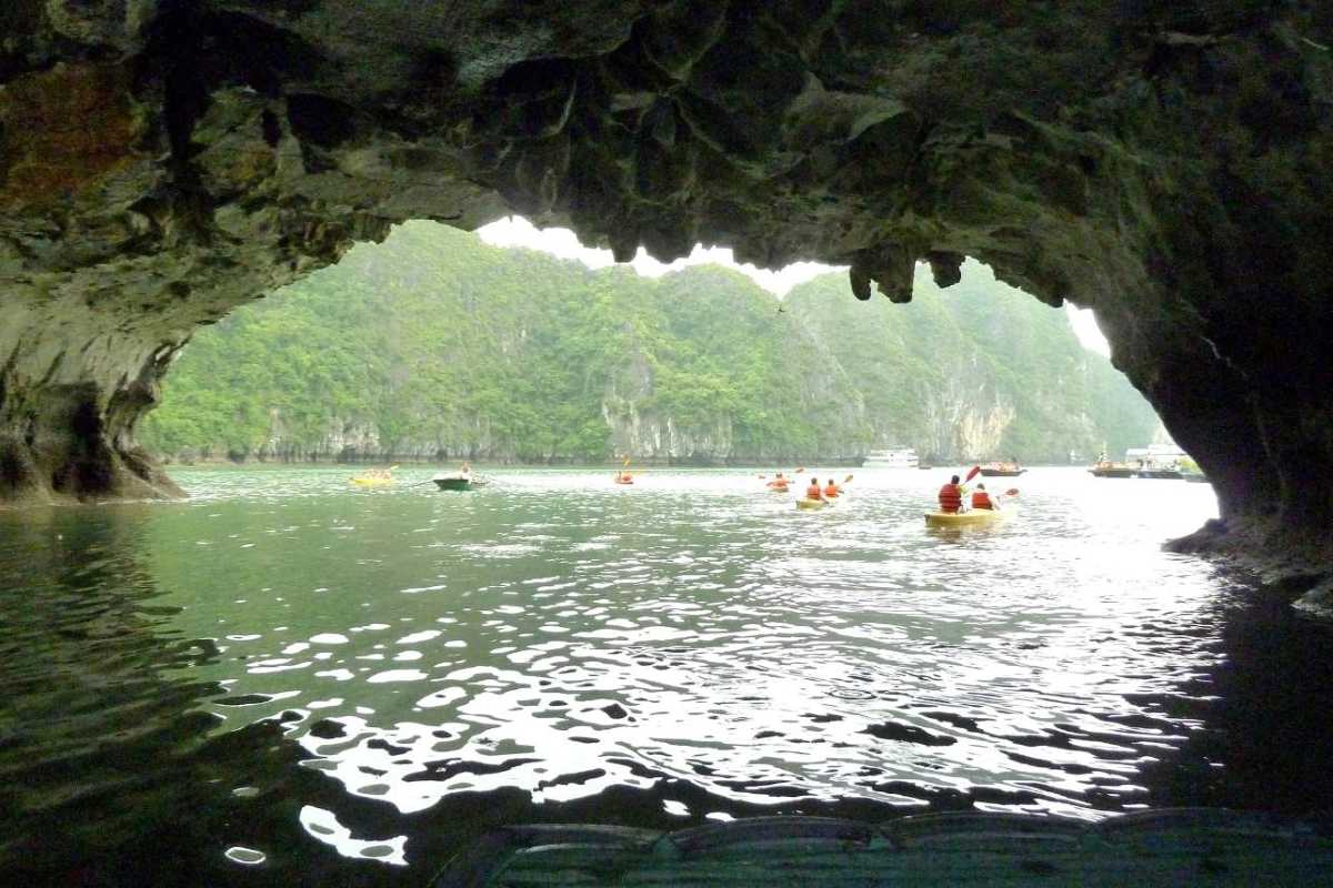 Luon Cave Halong Bay Limestone Cave Entrance and Scenic View Entrance of limestone cave with scenic view of islands in Luon Cave, Halong Bay