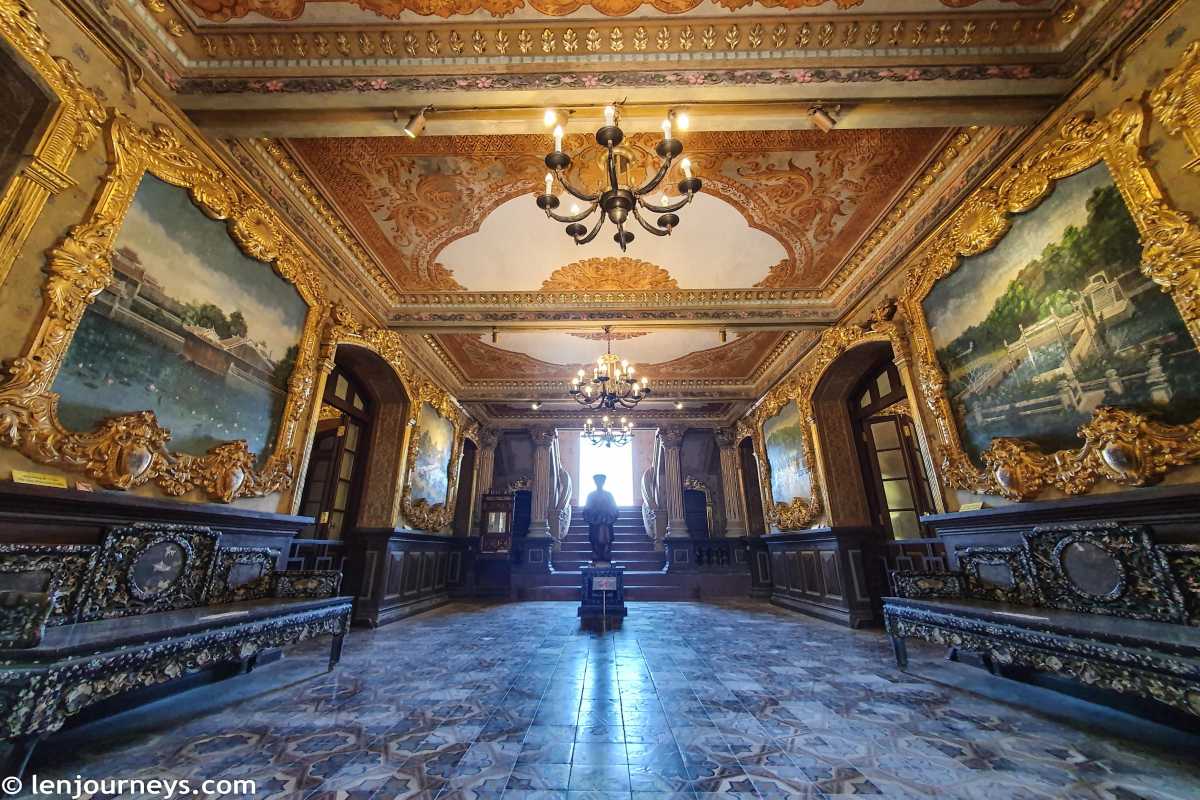 Luxurious Interior with Antique Furniture Ornate room with antique wooden furniture and gilded wall decorations inside An Dinh Palace