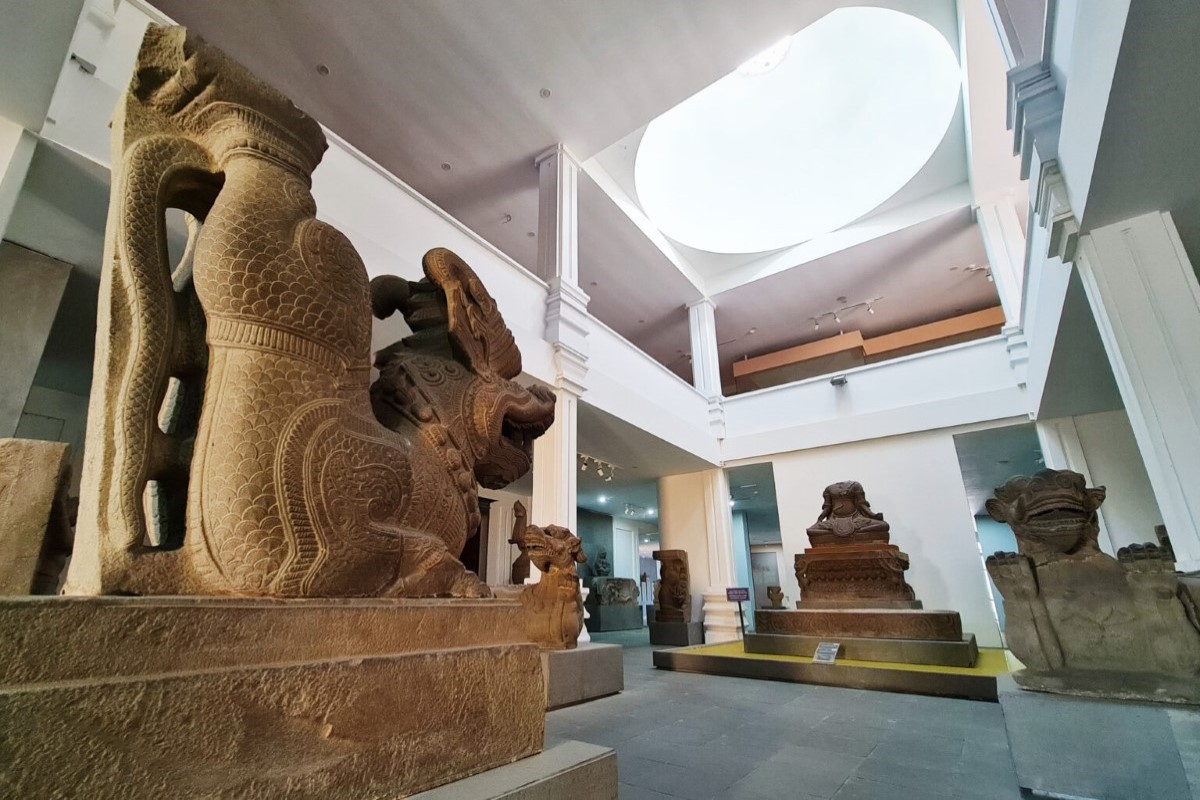 Majestic stone sculptures displayed inside the Cham Museum exhibition hall in Da Nang.