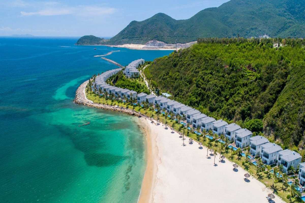 Nha Trang Bay luxury seaside villas Luxury seaside villas overlooking the ocean at Nha Trang Bay with lush greenery