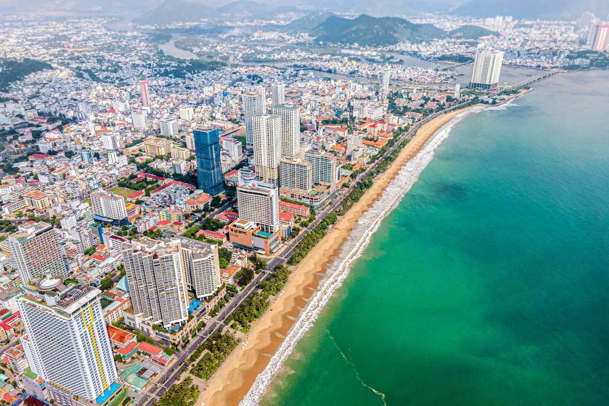 Nha Trang beachfront hotel zone Aerial view of Nha Trang’s beachfront hotel strip and golden sand beaches along the coast