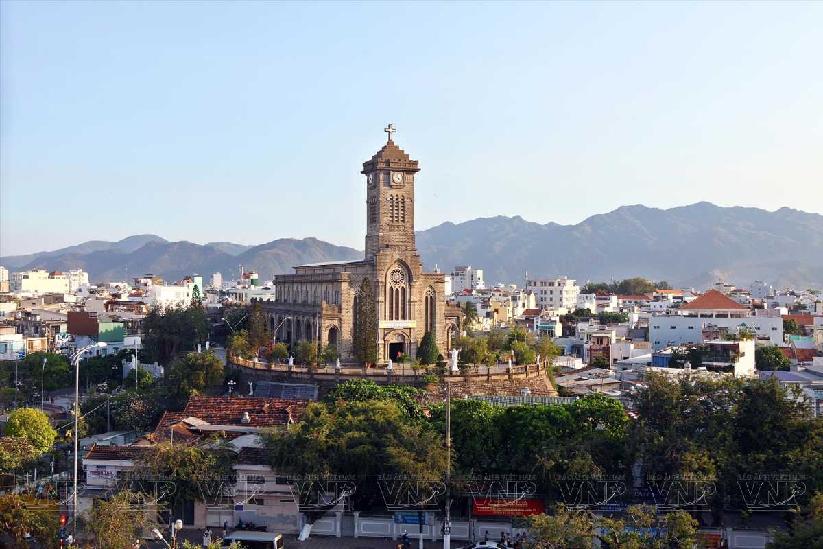 Church on Elevated Hilltop in Cityscape Wide view of Nha Trang Mountain Church overlooking the city from its elevated stone base