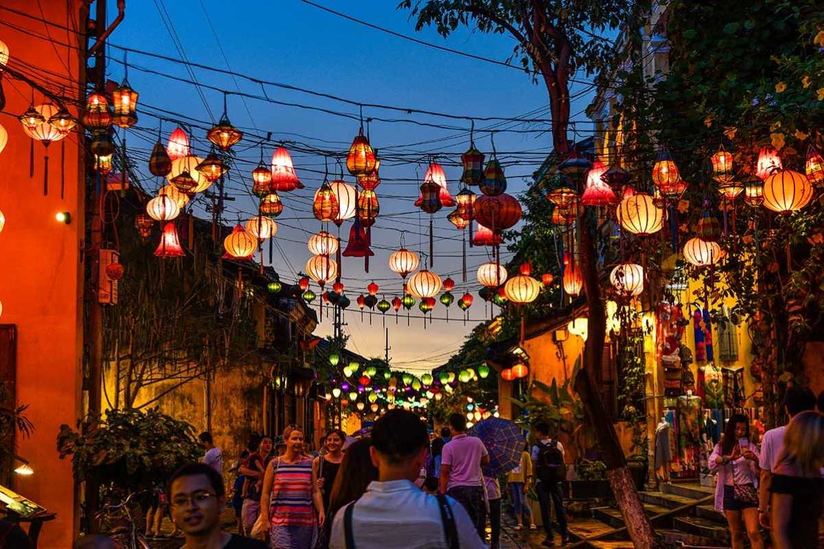 Nighttime Crowd and Lanterns at Hoi An Night Market A large crowd enjoying the colorful lanterns and festivities at the bustling Hoi An Night Market