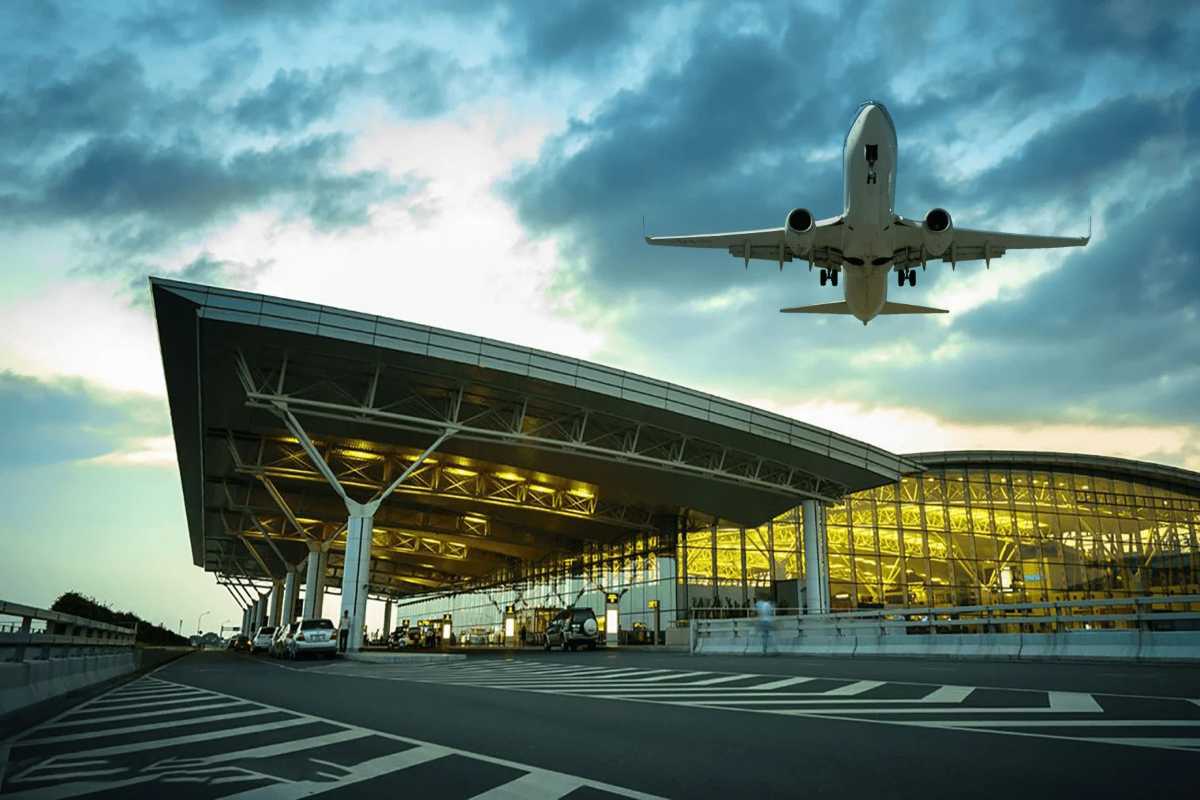Noi Bai International Airport Aircraft Taking Off Airplane ascending from runway at Noi Bai International Airport under a partly cloudy sky