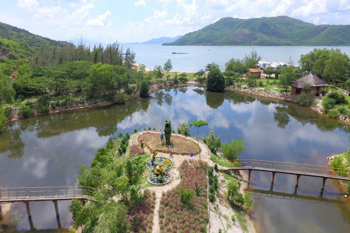 Orchid Stream Island Lake and Garden View Nha Trang Elevated view of lake surrounded by gardens and footbridges at Orchid Stream Island, Nha Trang