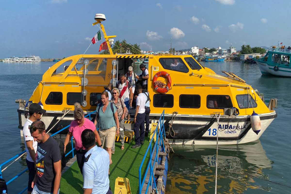 Phu Quoc International Cruise Terminal Bus Parking Area Fleet of tour and shuttle buses parked at Phu Quoc International Cruise Terminal parking area