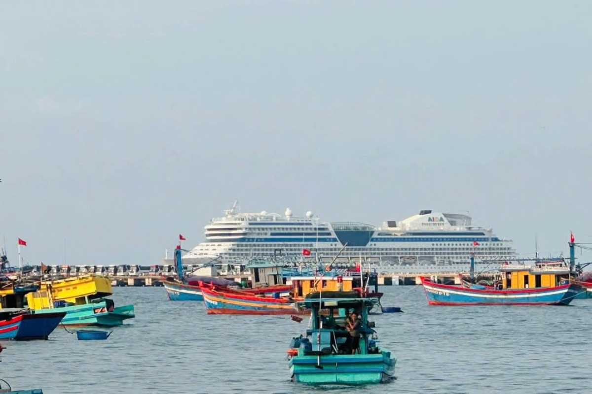 Phu Quoc International Cruise Terminal Coastal Fishing Boats Traditional fishing boats near Phu Quoc International Cruise Terminal with cruise ship in distance
