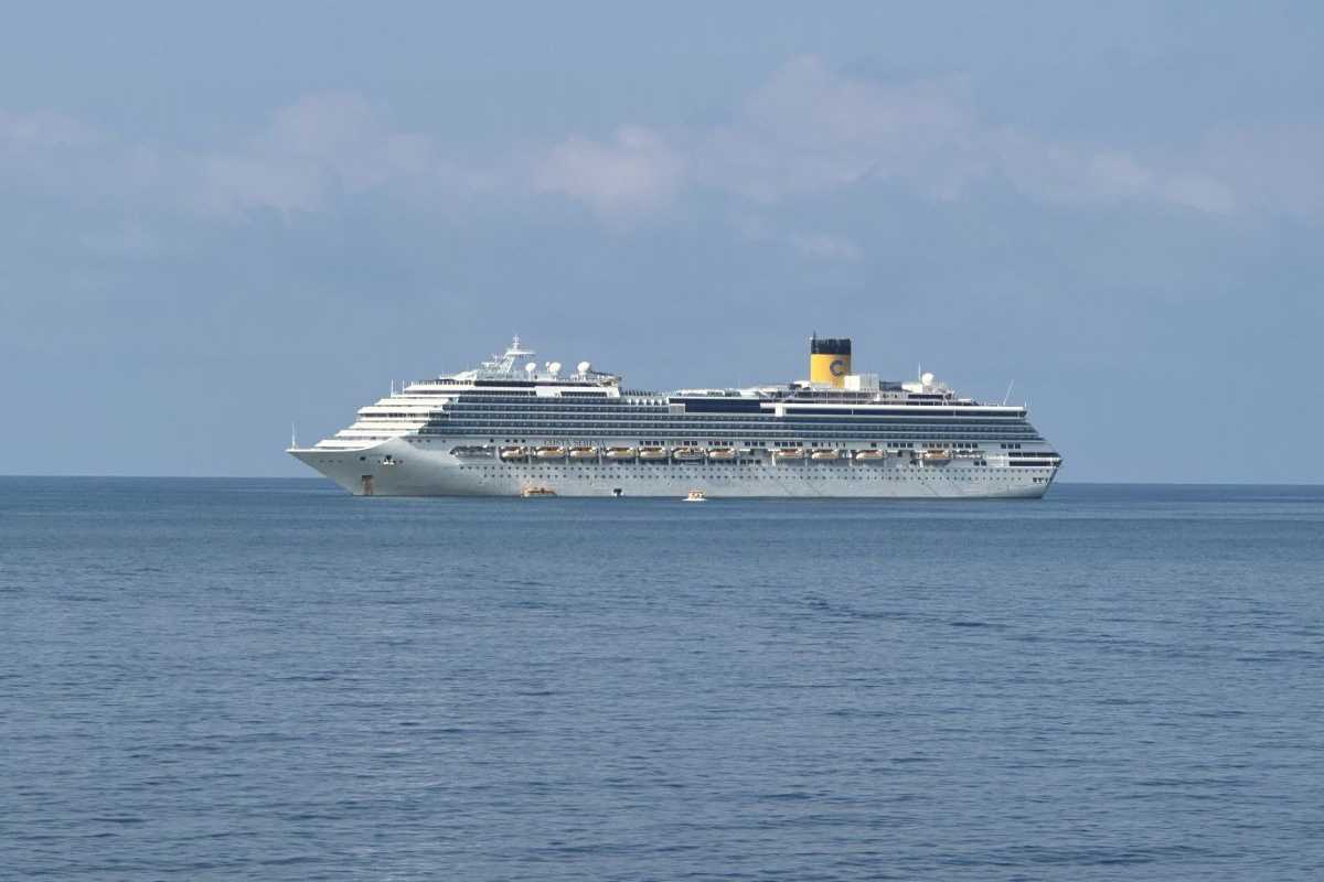 Phu Quoc International Cruise Terminal Cruise Ship at Sea Cruise ship anchored offshore near Phu Quoc International Cruise Terminal under clear skies