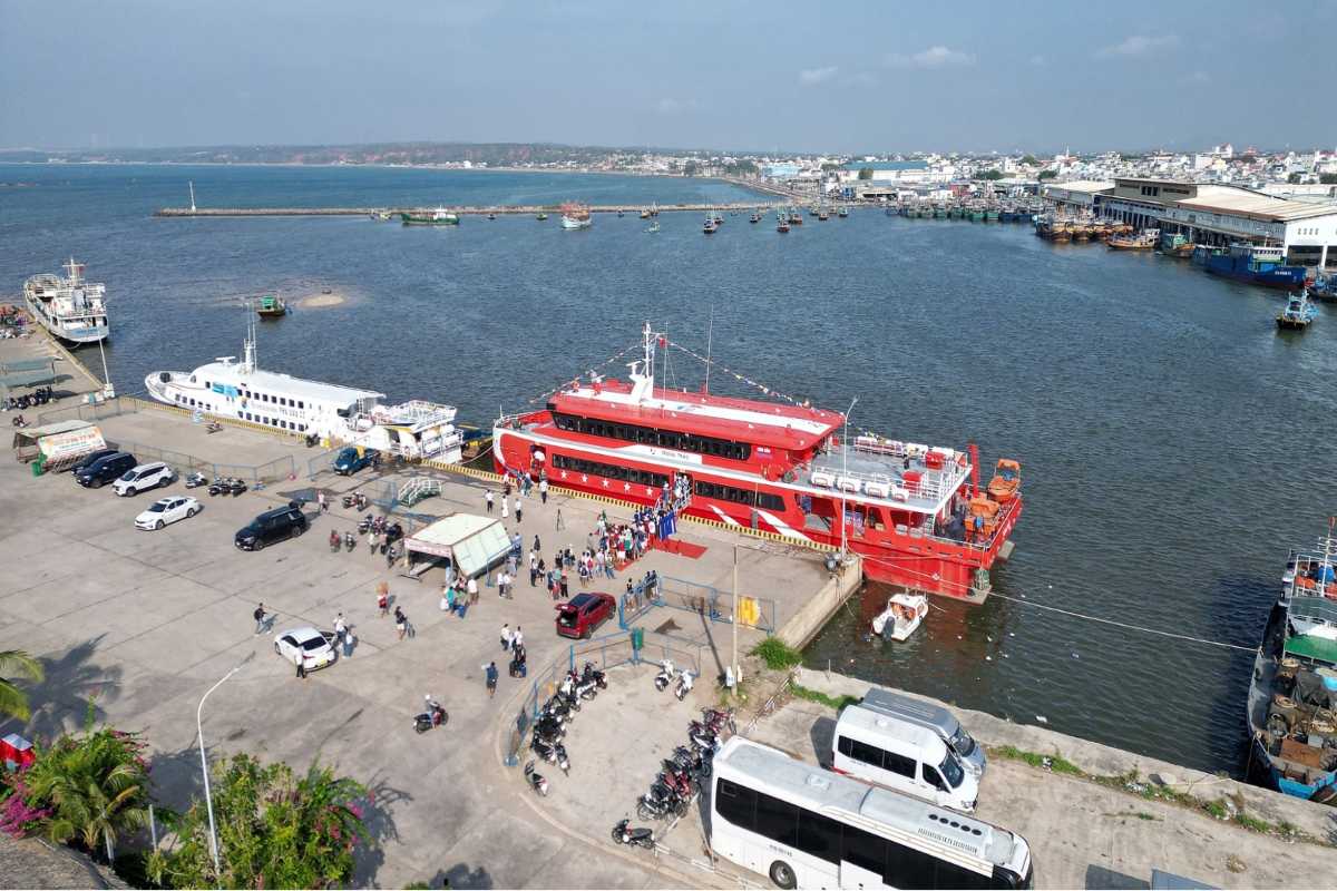 Phu Quoc International Cruise Terminal Passenger Ferry Dock Red passenger ferry docking at Phu Quoc International Cruise Terminal busy pier with passenger activity