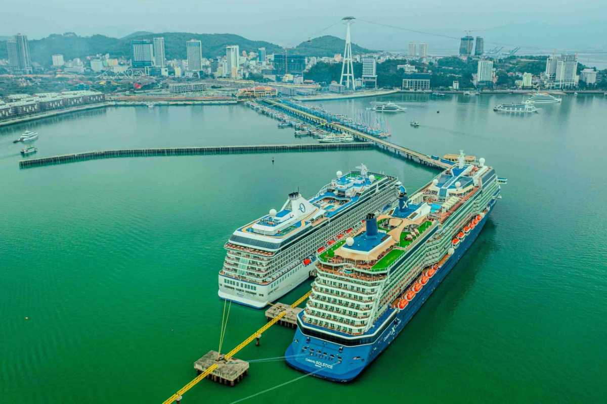 Phu Quoc International Cruise Terminal Twin Cruise Ships Two large cruise ships docked side-by-side at Phu Quoc International Cruise Terminal harbor
