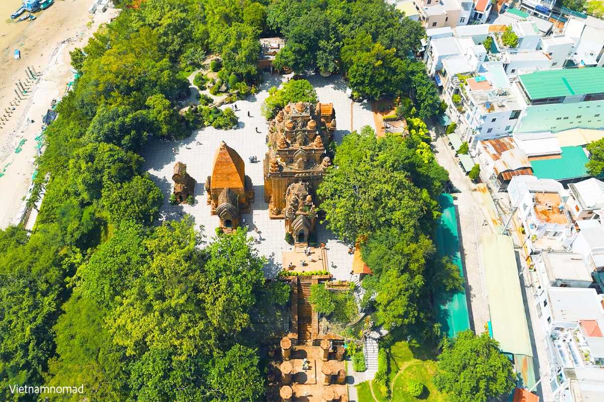 Ponagar Cham Towers aerial view Aerial view of Ponagar Cham Towers complex in Nha Trang with temples surrounded by trees and city buildings