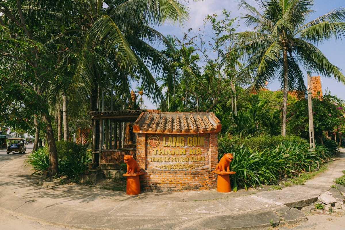 Peaceful Pottery Village Street with Clay Products on Display Quiet village street lined with handmade pottery products for sale at Thanh Ha Pottery Village