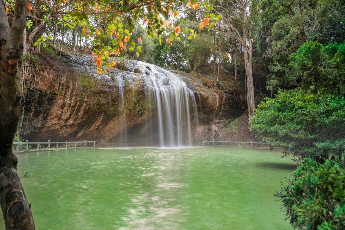 Prenn Waterfall Da Lat emerald green pool and falls Prenn Waterfall Da Lat featuring an emerald green pool beneath cascading waterfall with surrounding lush foliage.