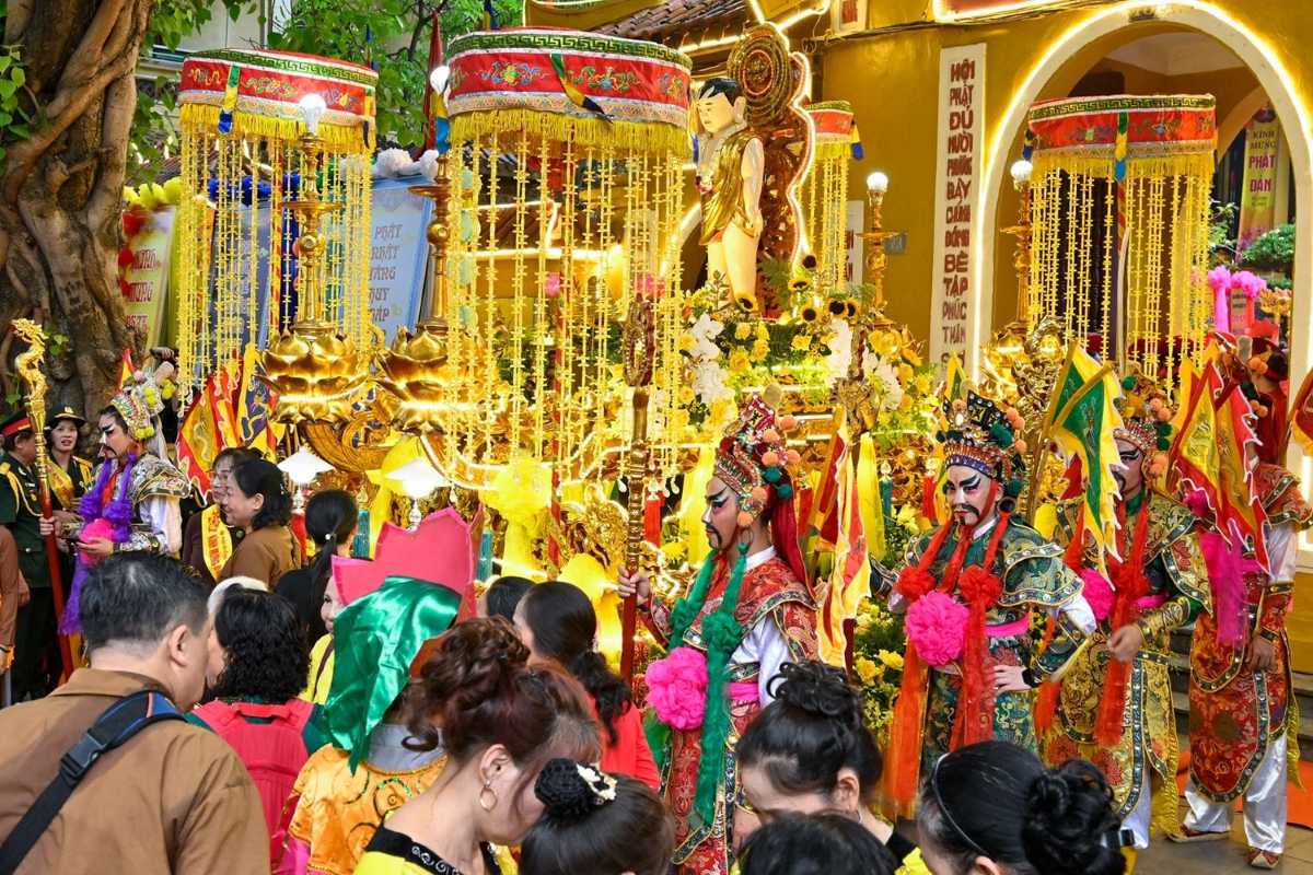 Worshippers Lighting Incense at Quan Su Pagoda Hanoi Devotees lighting incense sticks at the altar inside Quan Su Pagoda