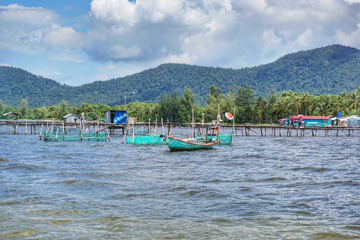 Rach Vem Coastal Pier and Fishing Boats Traditional fishing boats moored near Rach Vem coastal pier at Phu Quoc's fishing village