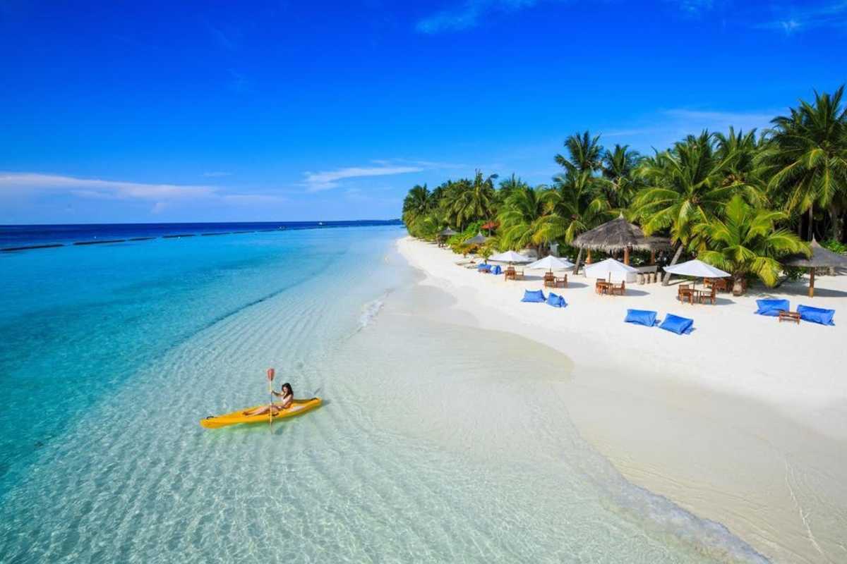 Relaxing on Long Beach Phu Quoc Long Beach (Bãi Dài) Phu Quoc with beach loungers, perfect for relaxation.