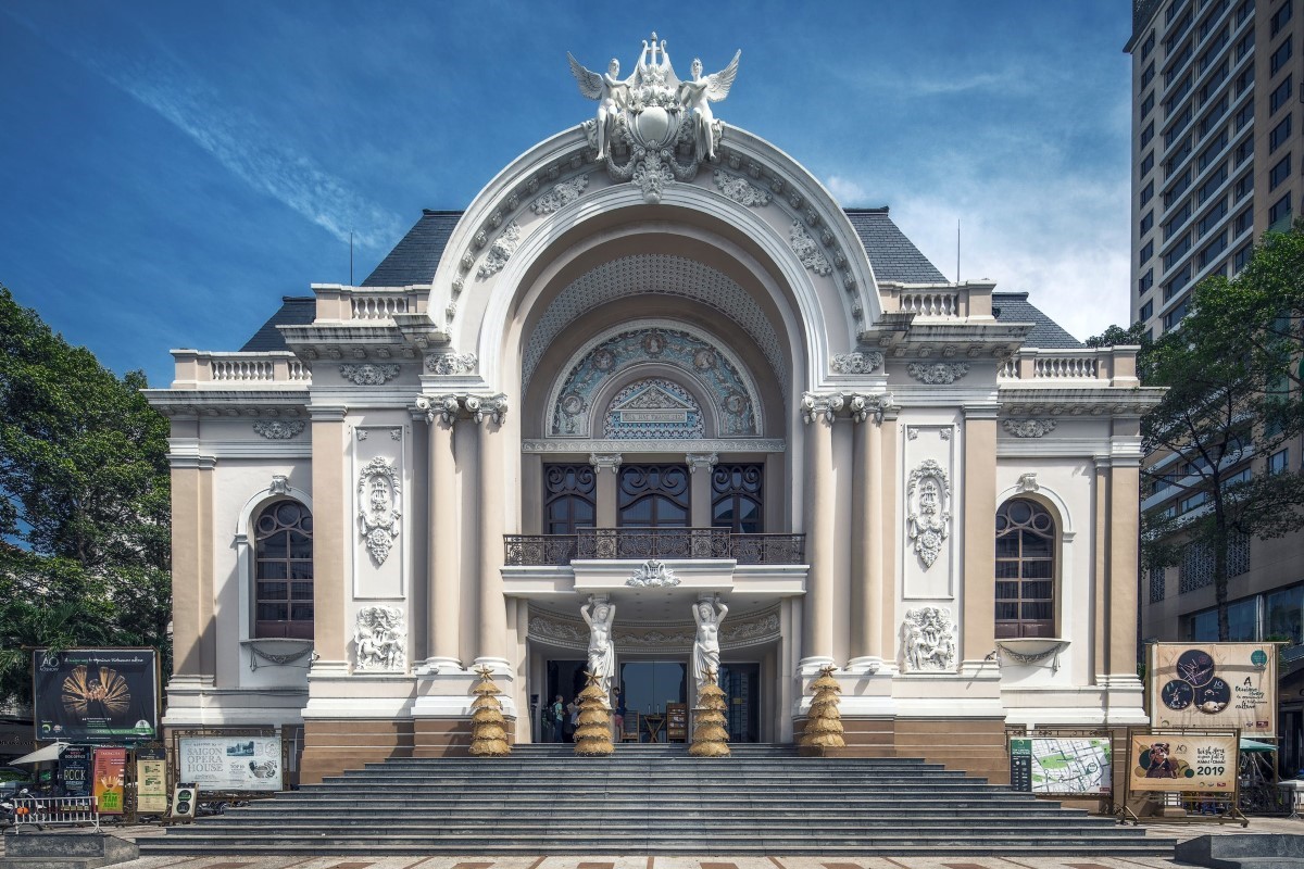 Interior view of Saigon Opera House auditorium with red seats and classic design