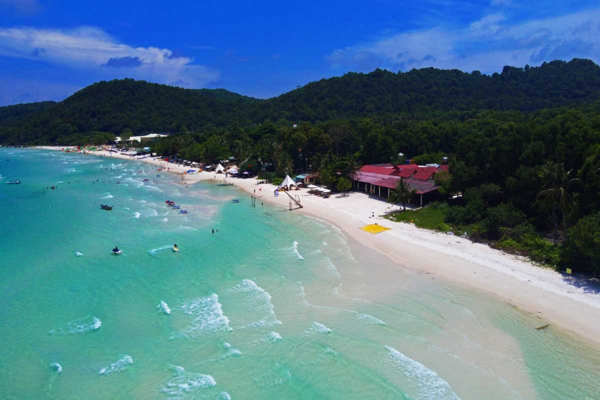 Sao Beach Phu Quoc Aerial Beach View Aerial shot showing the expansive white beach and blue sea at Sao Beach Phu Quoc